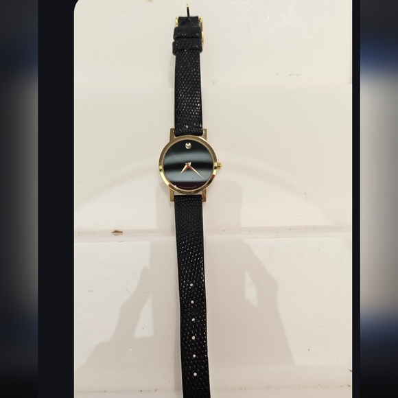 Movado Accessories - Vintage Black and Gold Watch